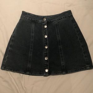 Navy blue denim skirt with buttons down the middle